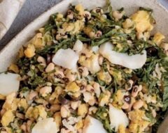 Crumbed Turnip greens with cod and black-eyed peas